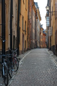 Image of narrow street with residential buildings close together