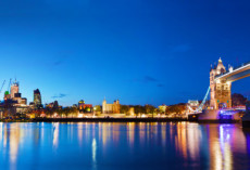 Tower Bridge in London, the UK at night. Panorama of the city centre