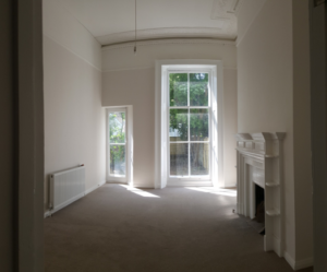 Refurbished Regency living room, light enters through large windows