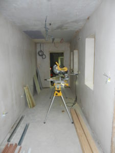 Builder's tools in a partly refurbished room