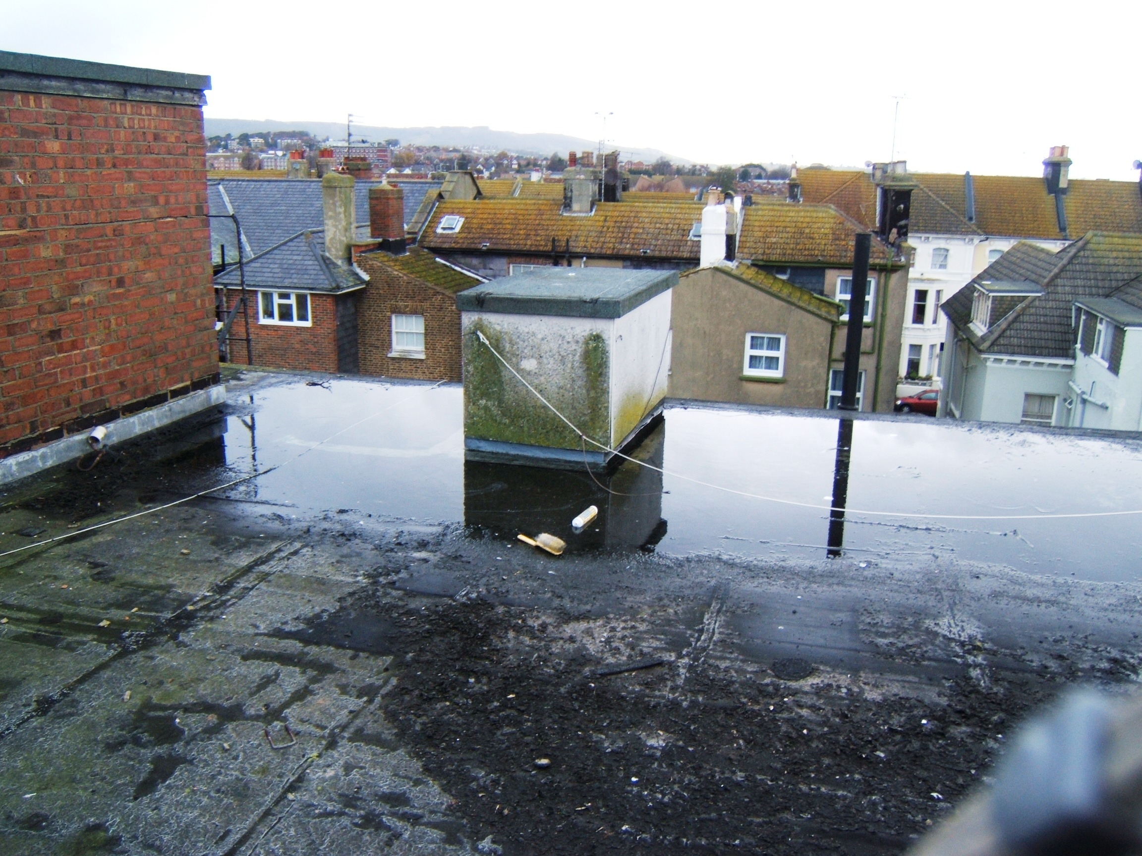 Flooding to asphalt roof