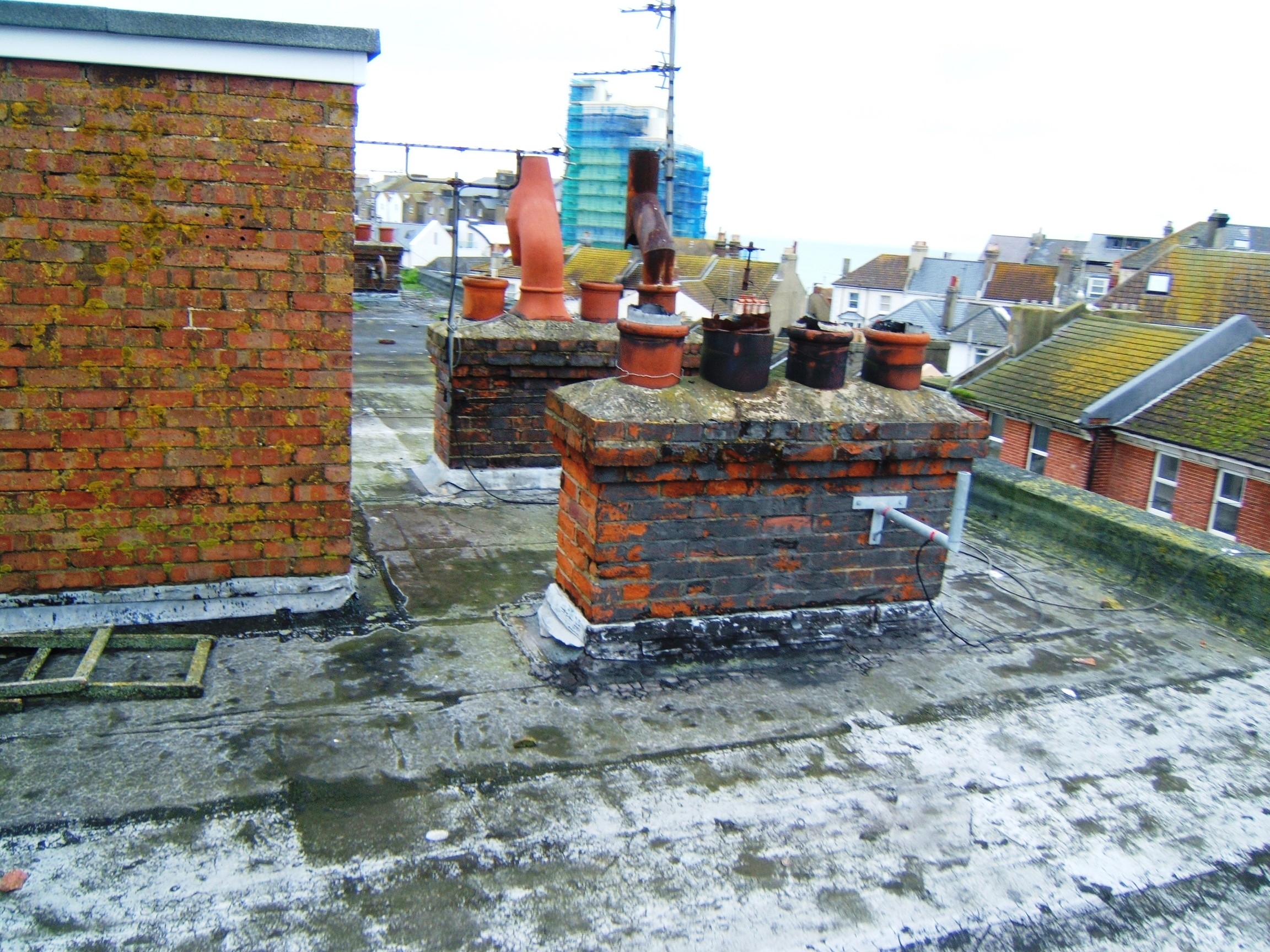 Open chimney pots causing water ingress