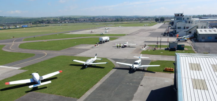 Aerial view of planes and runway at Shoreham Airport